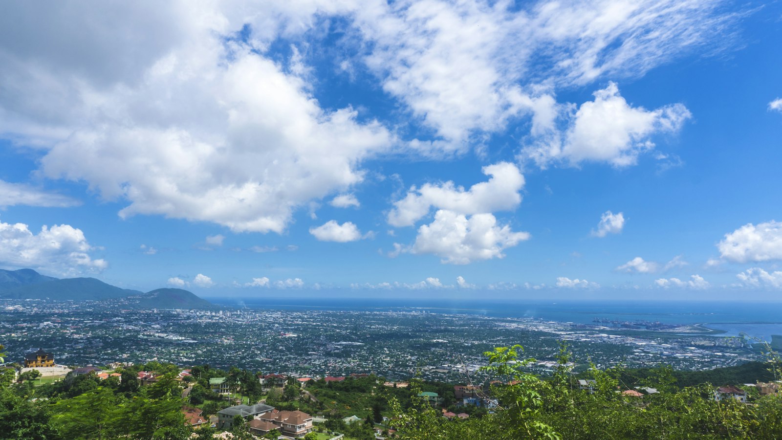 Aerial view of Kingston, Jamaica from Red Hills Road with the harbour and Blue Mountains foothills